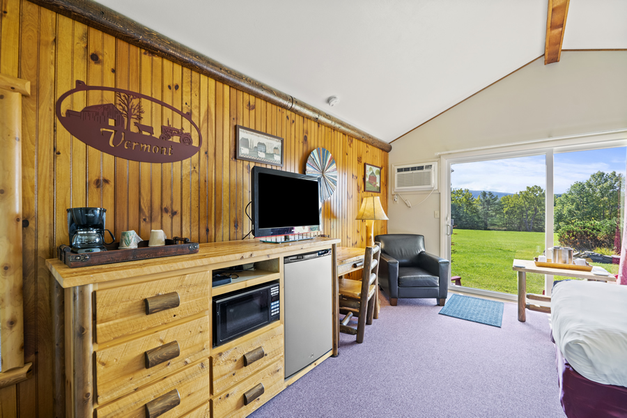 north-shire-lodge-manchester-vt-bungalow north shire lodge cottages interior with micro and desk, tv and fridge,