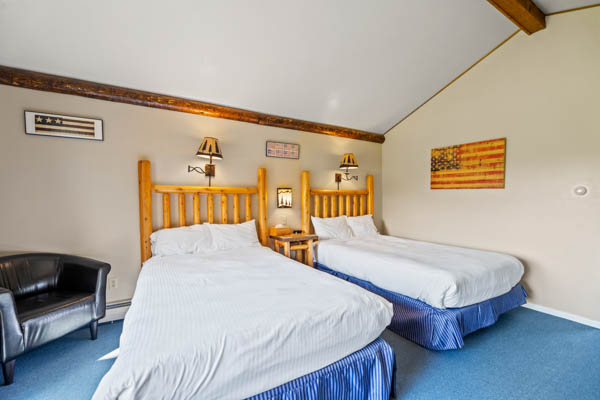 room 8 features two extra long double beds (same length as a king bed) with duvet comforters.