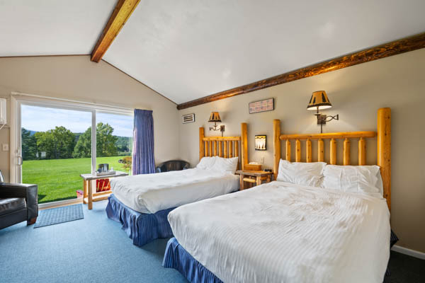 room 8 features two extra long double beds (same length as a king bed) with duvet comforters.