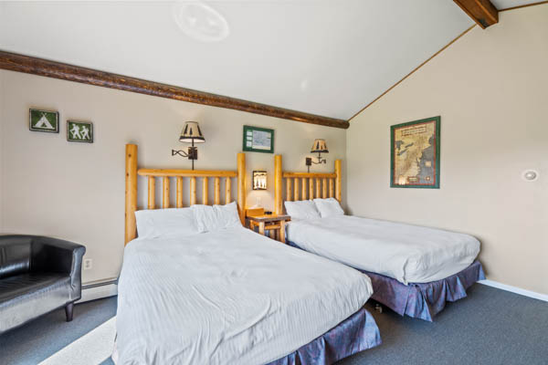 room 9 features two extra long double beds (same length as a king bed) with duvet comforters.