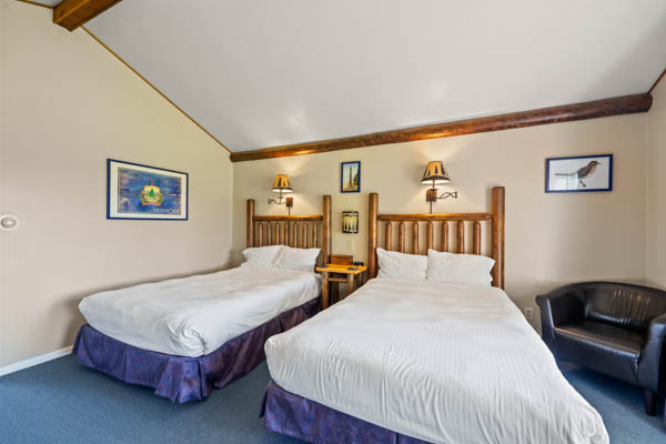 room 3 features two extra long double beds (same length as a king bed) with duvet comforters.